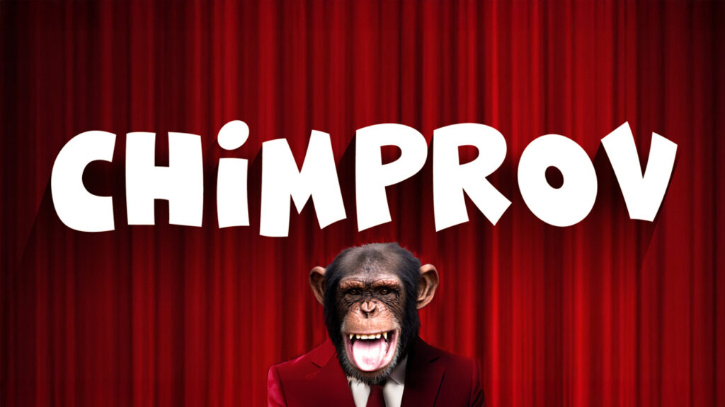 Monkey in fancy suit standing behind the title "Chimprov"